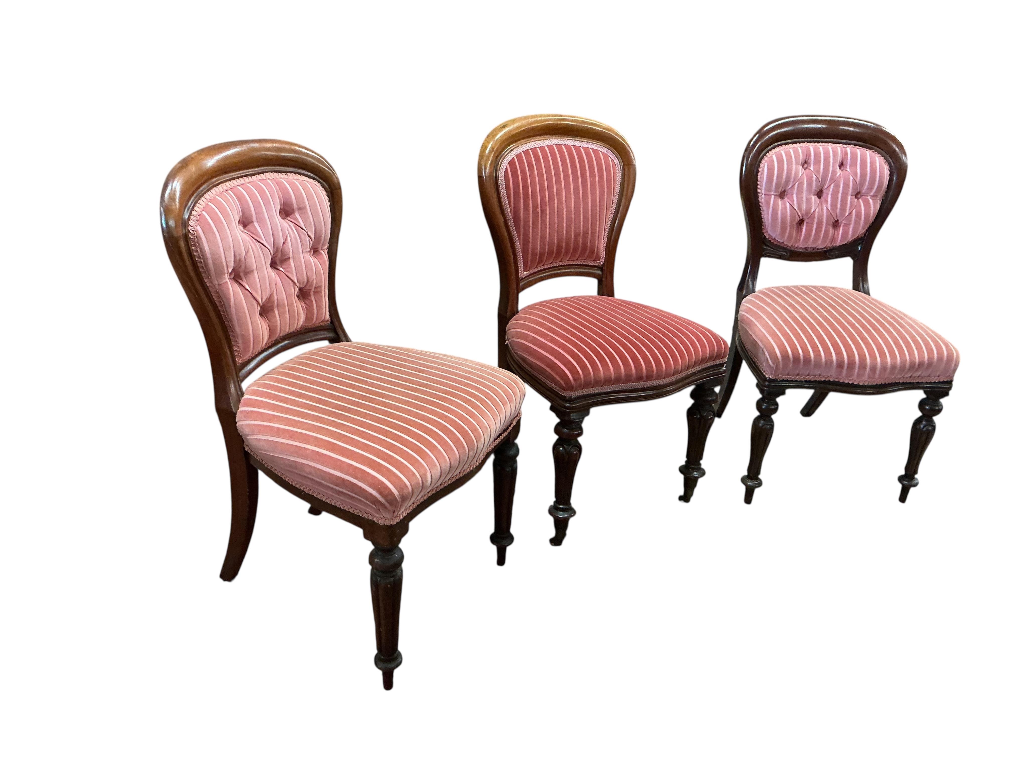 A harlequin set of nine mahogany balloon back dining chairs